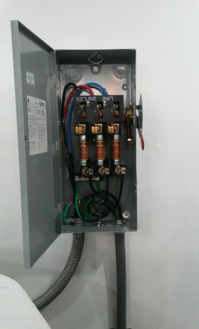 Three-phase disconnect switch installed for Smoke Detector Installation in Halls
