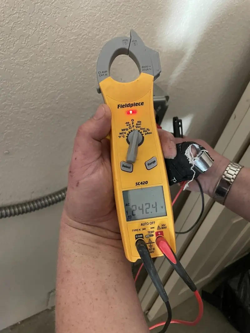 Voltage testing with clamp meter during Generator Installation in Halls